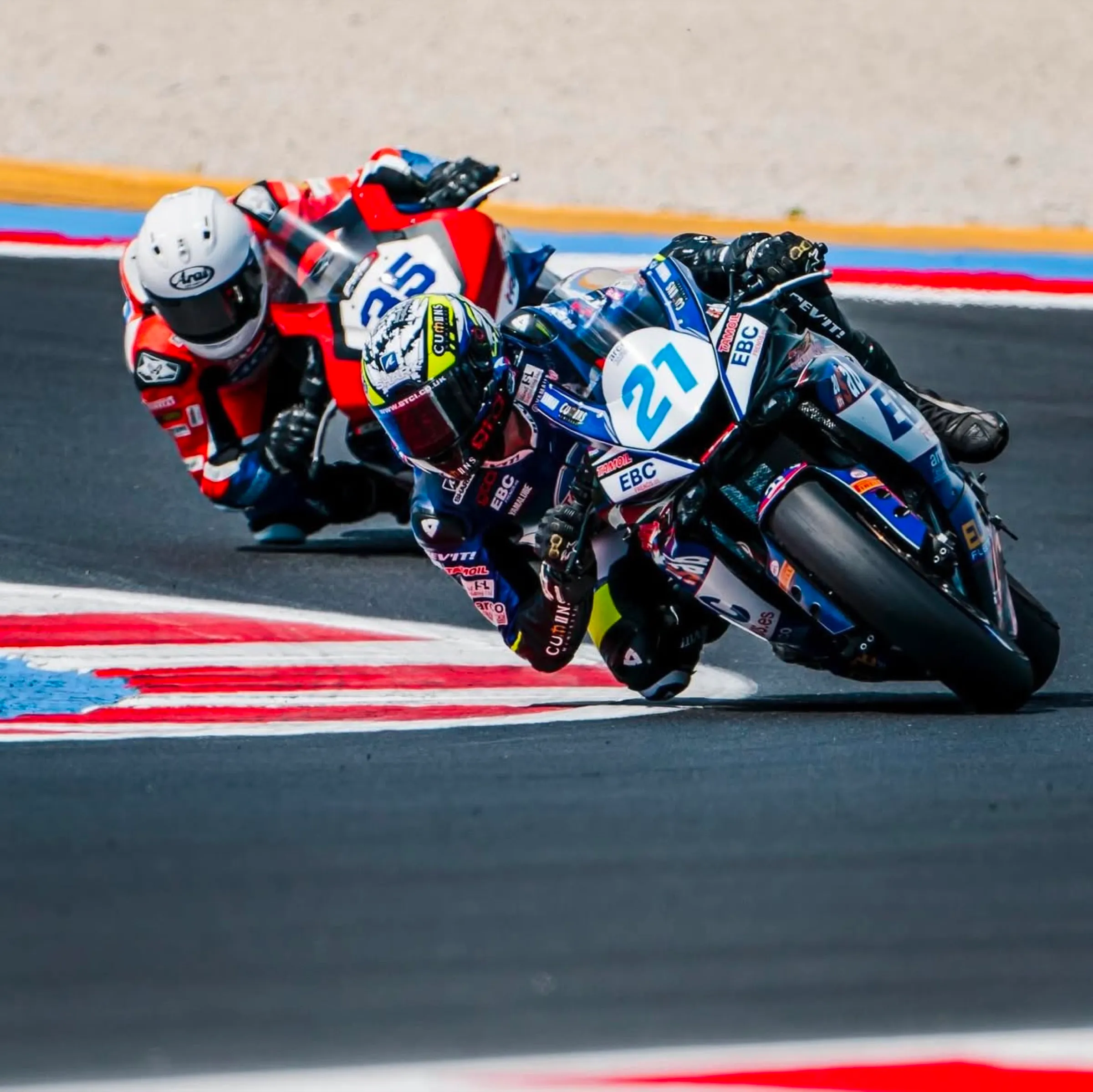 British Superbike riders through a corner