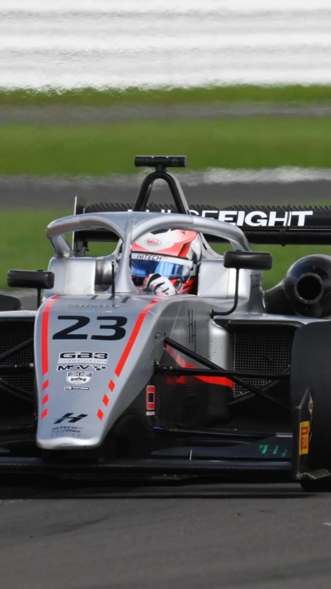 F4 car number 23 head-on in the pit lane