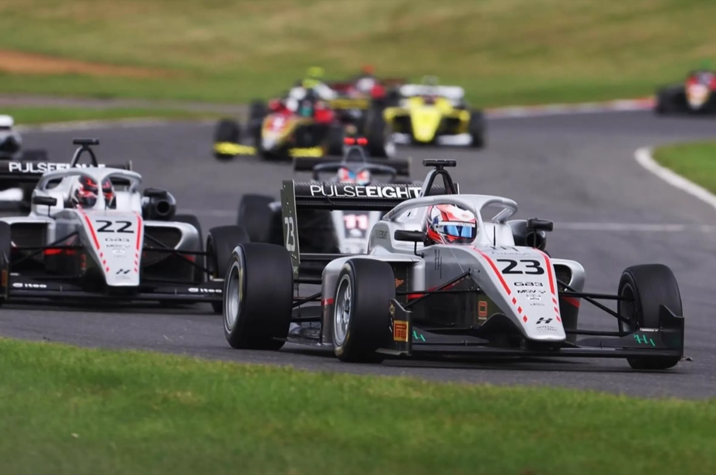 F4 cars at the start of a race