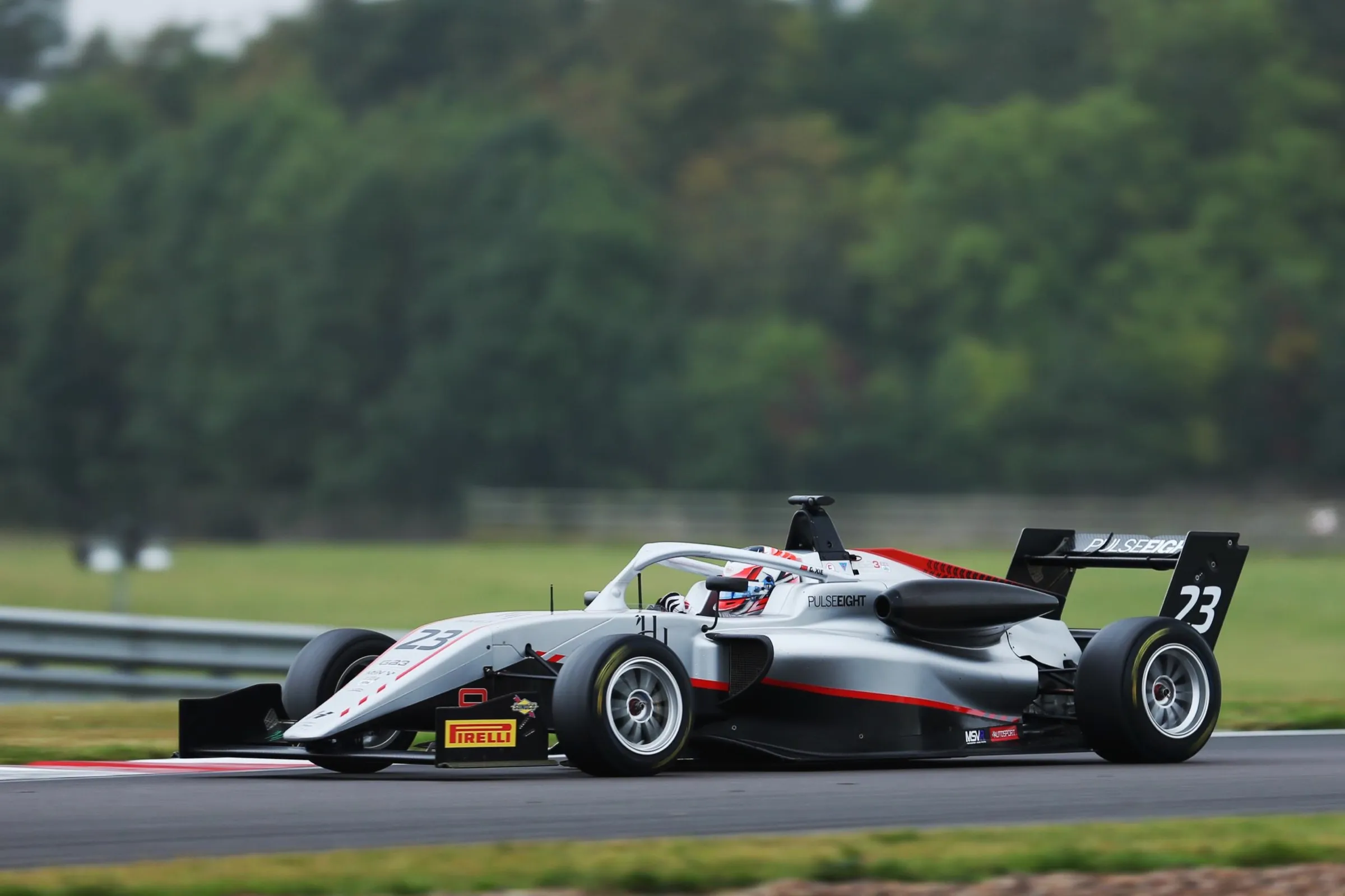 White F4 car on track