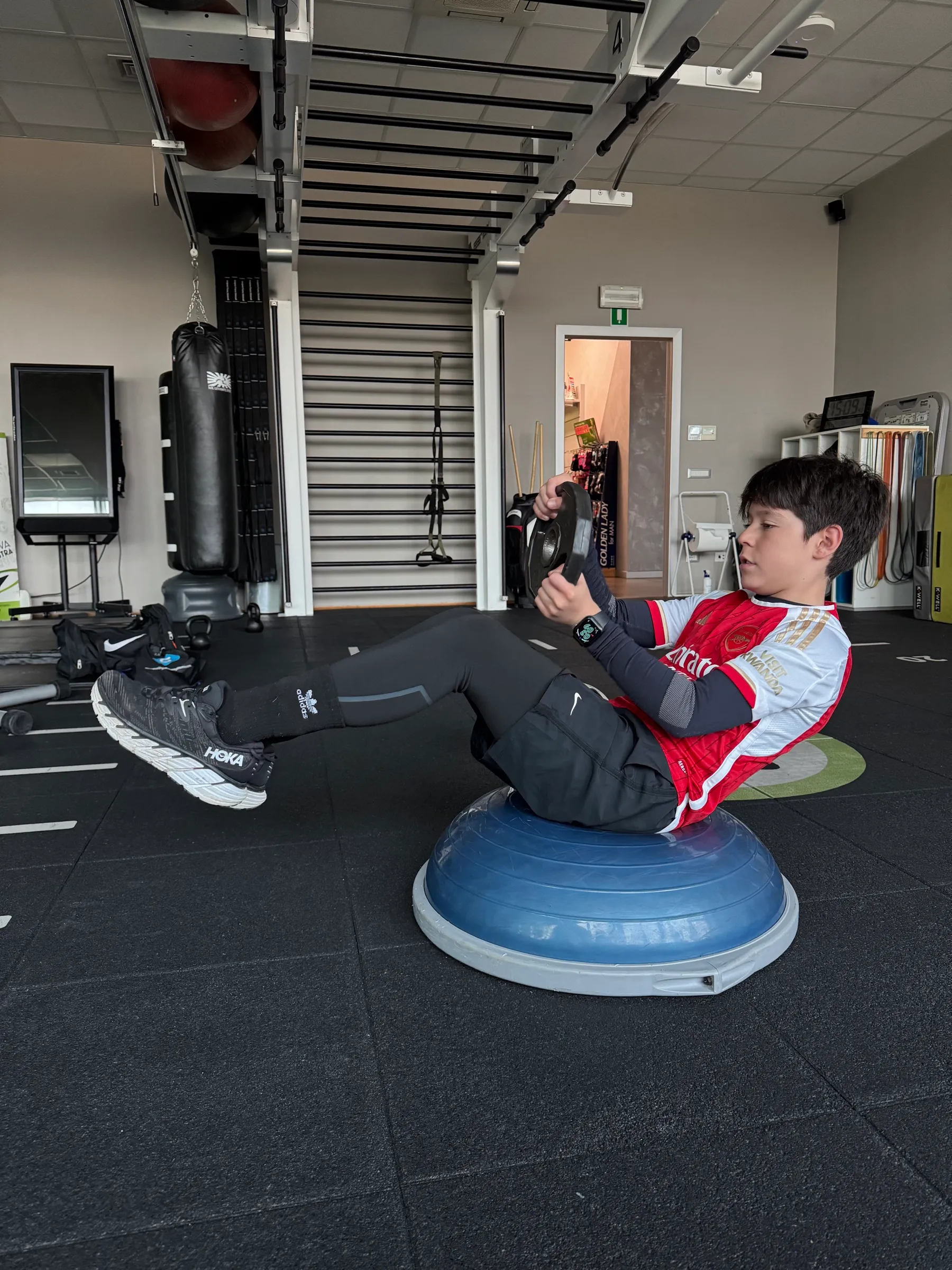 Young driver doing core work on a balance trainer
