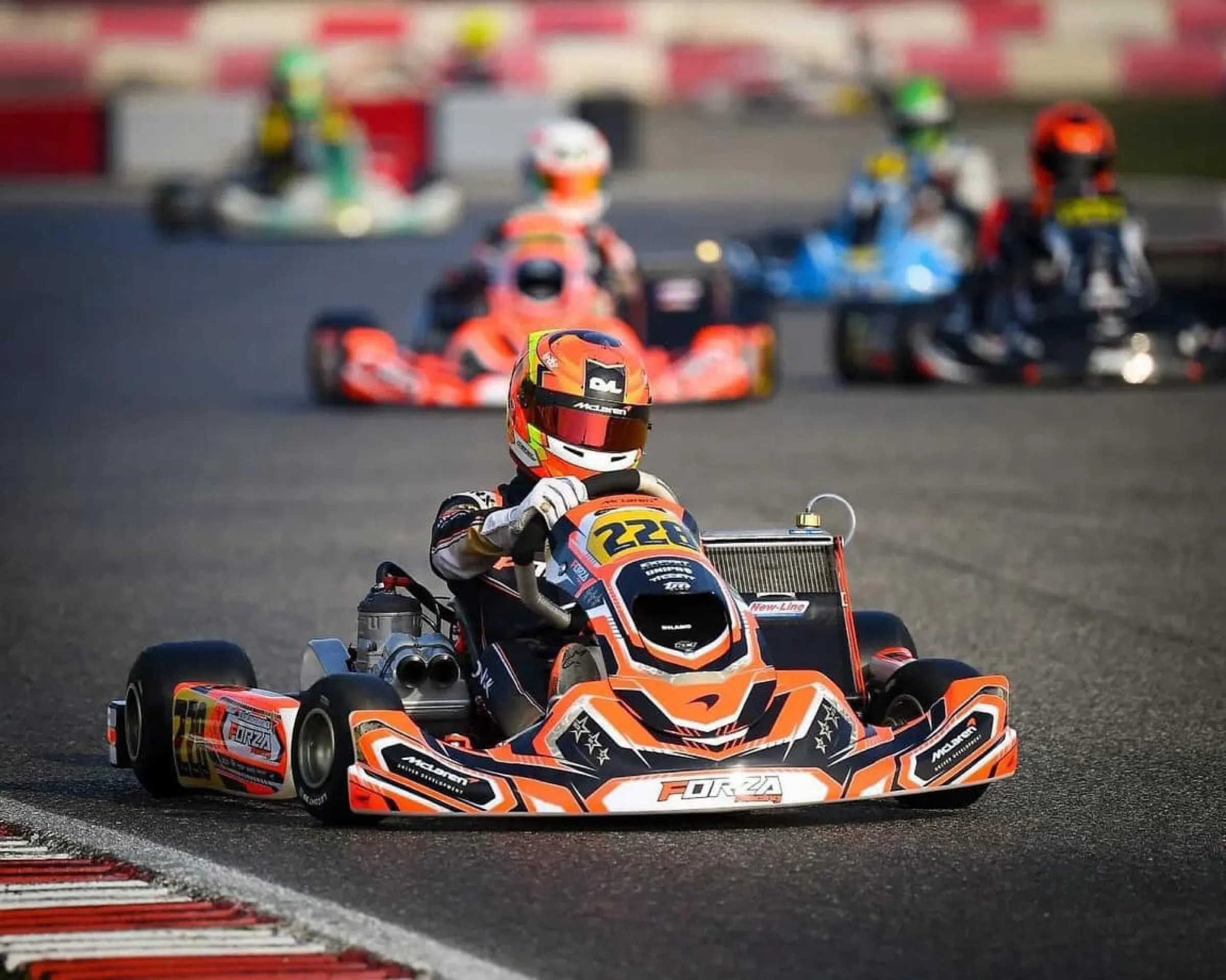 Karts racing under floodlights