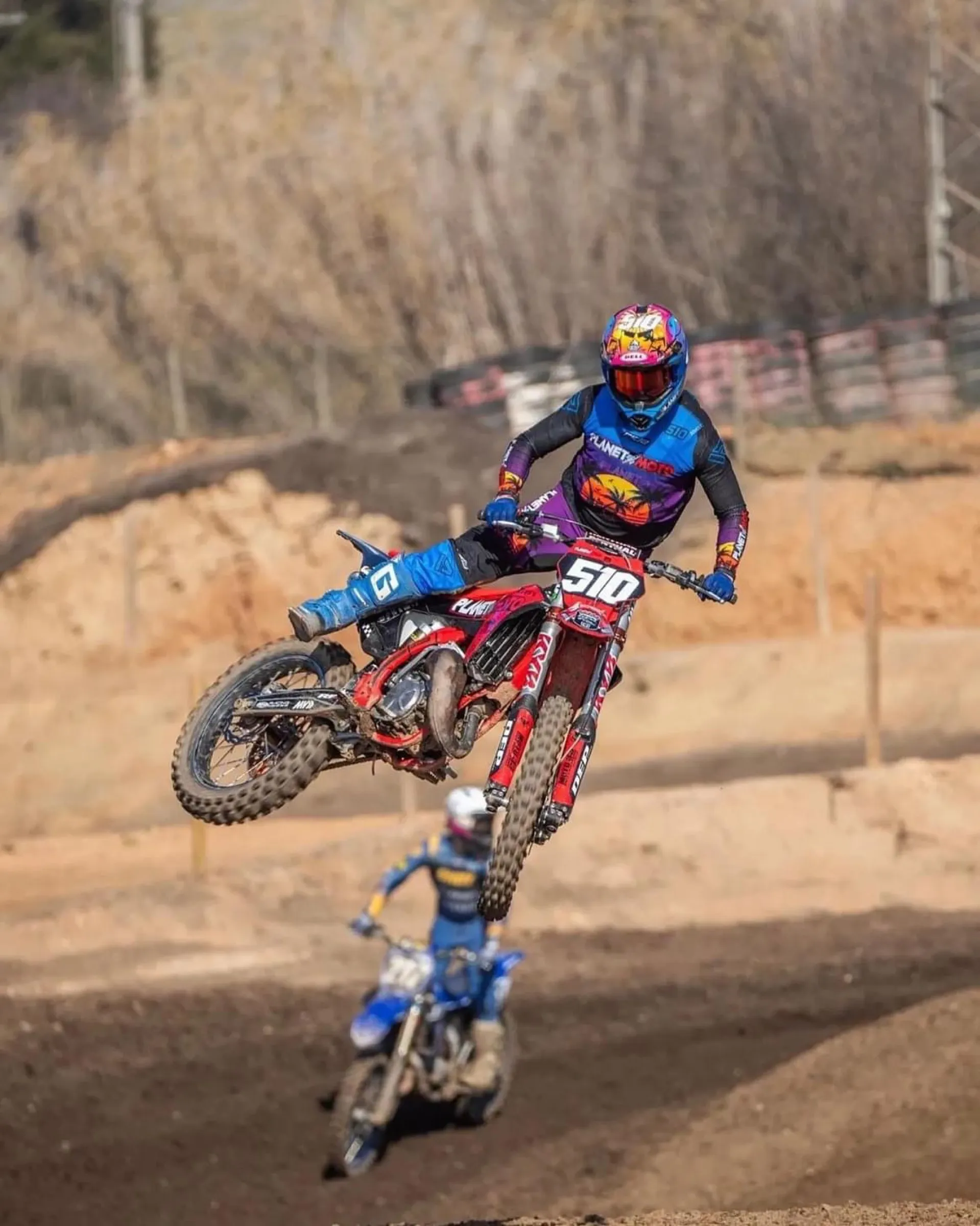 Motocross rider mid-jump