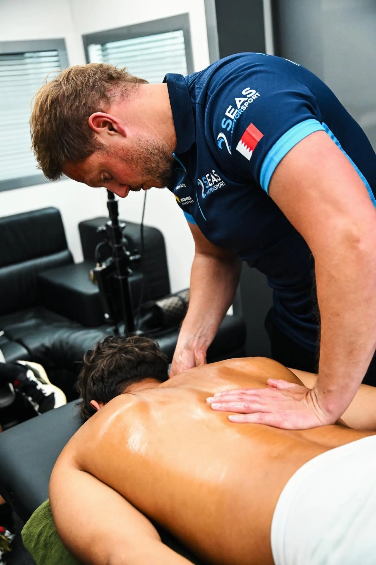Trackside physio treatment in the paddock
