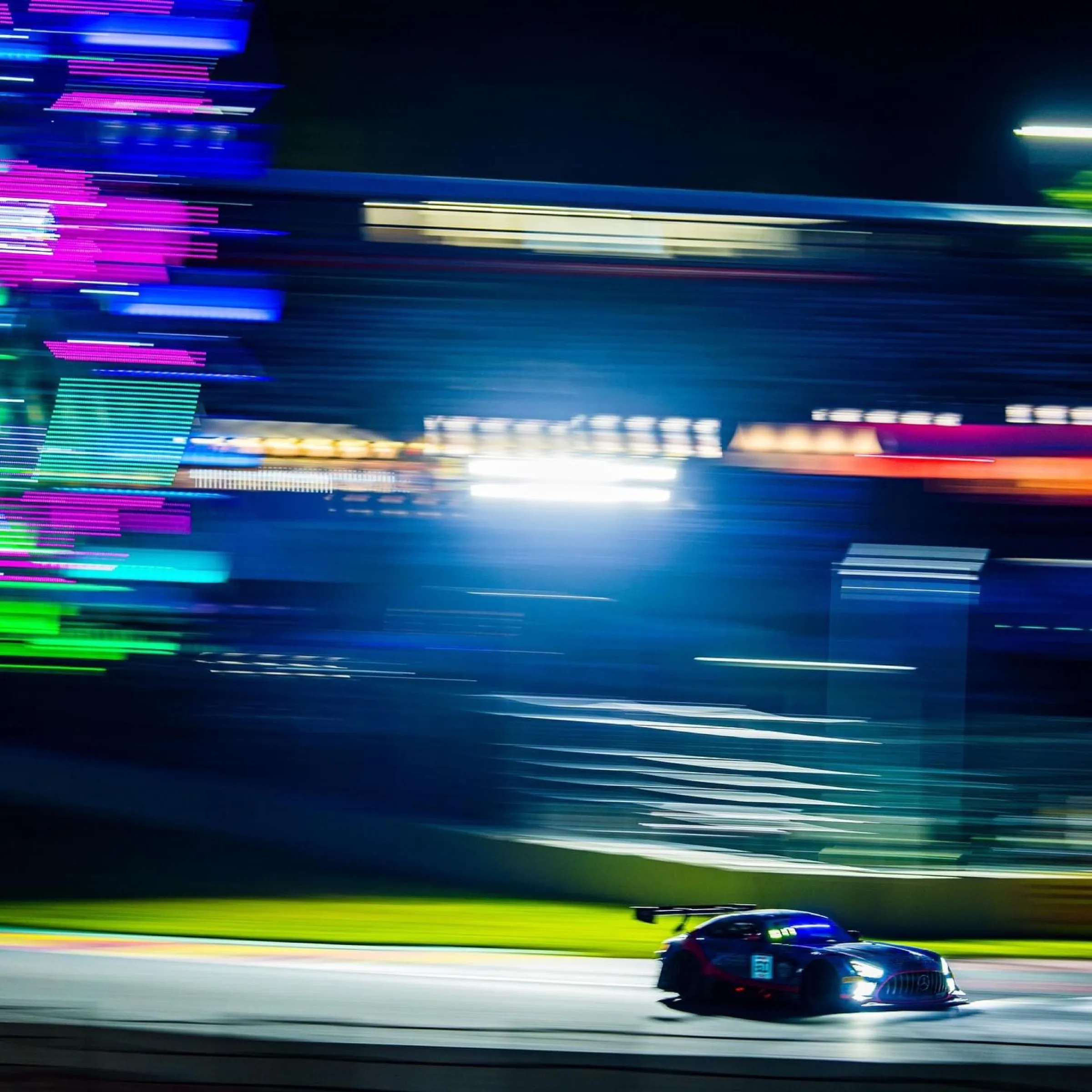 GT3 car in the pit lane at night